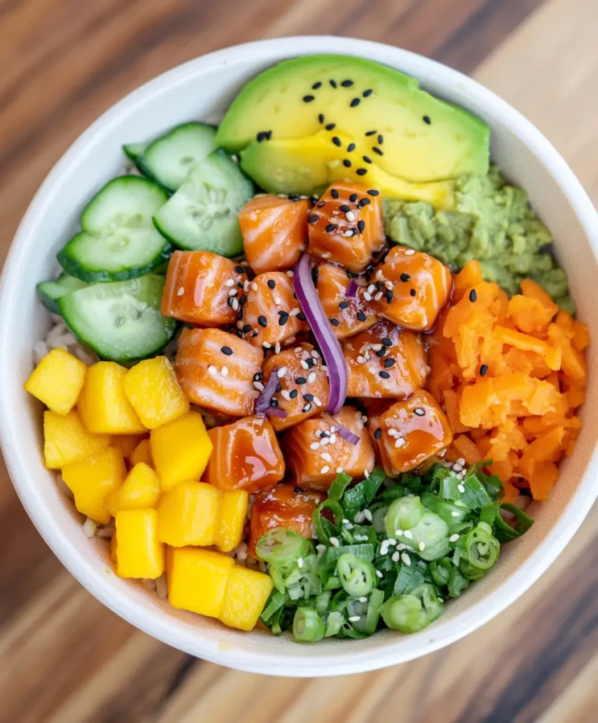 salmon poke bowl with mango and avocado